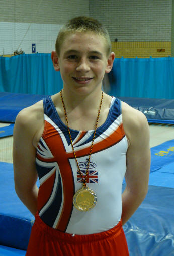 Scott Gregory & team winners medal