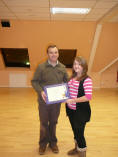 Isla Wendelken receiving Jack Petchey from Steven Nicholls