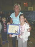 Alex bartkowiak receiving Jack Petchey from Marie Merritt