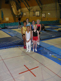 Young members with new trampoline bed